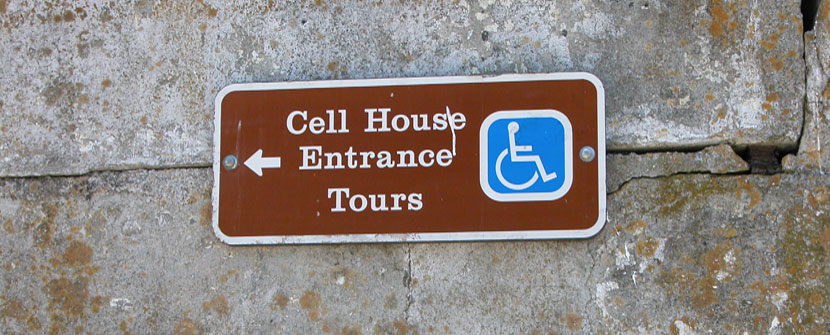 Cell House entrance tour sign