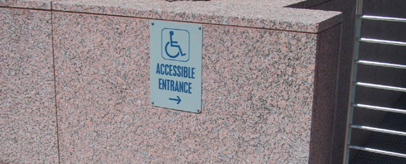 Accessible entrance directional sign